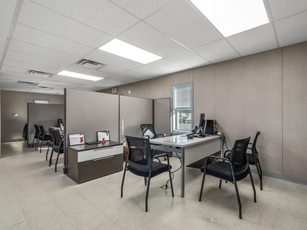 Open work area with desks and cubicles inside the 24 x 60 modular office Nadler leased to Kia of West Chester
