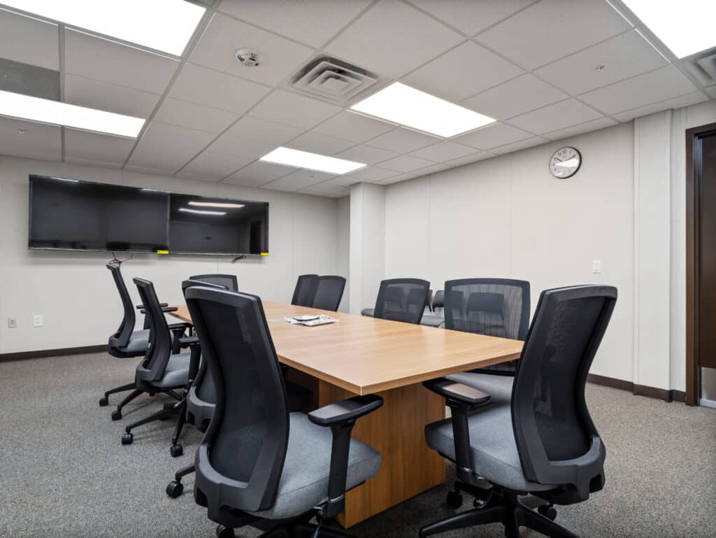 Conference room with wall displays in the modular military office building